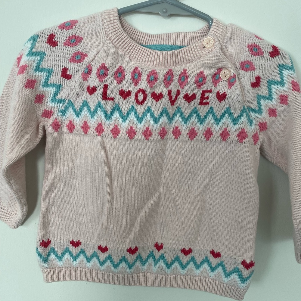 Pink blue and red sweater